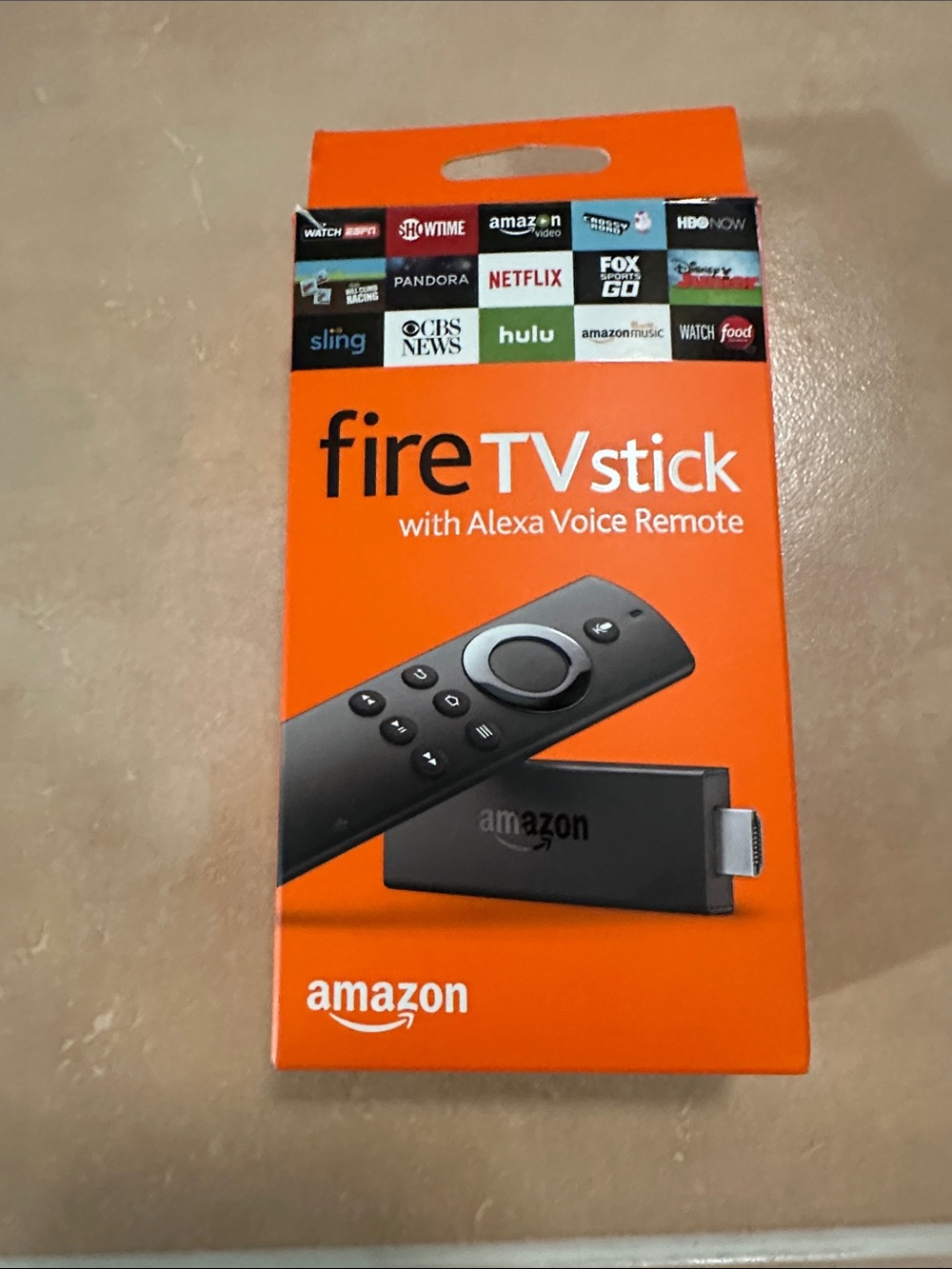 Amazon Fire TV Stick with Alexa Voice Remote - Orange and Black Packaging
